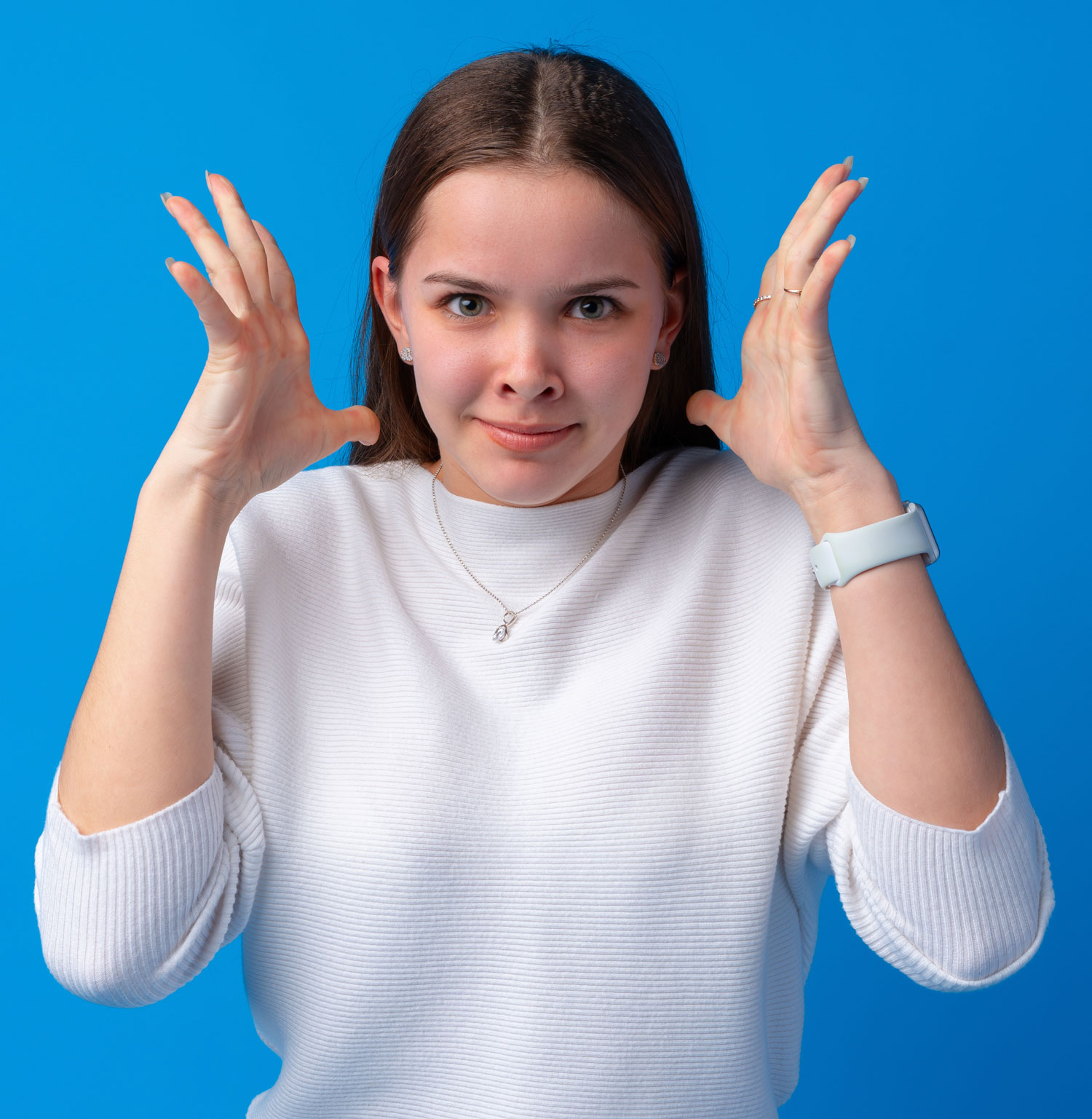 young-annoyed-angry-woman-holding-hands-in-furious-2022-03-05-19-18-05-utc.jpg